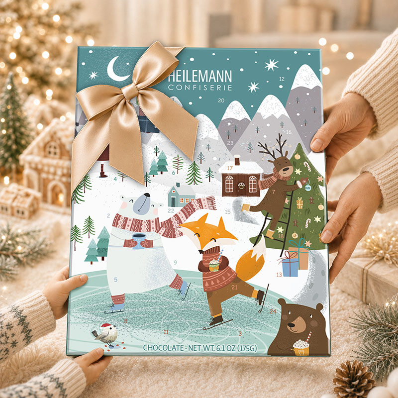 Heilemann Kinder-Adventskalender Edelvollmilch - als Geschenk in den Händen