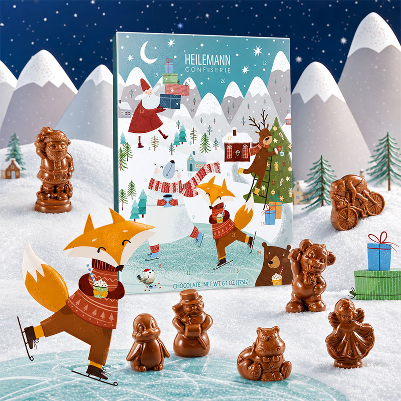 Heilemann Kinder-Adventskalender Edelvollmilch - Figuren um den Kalender rum